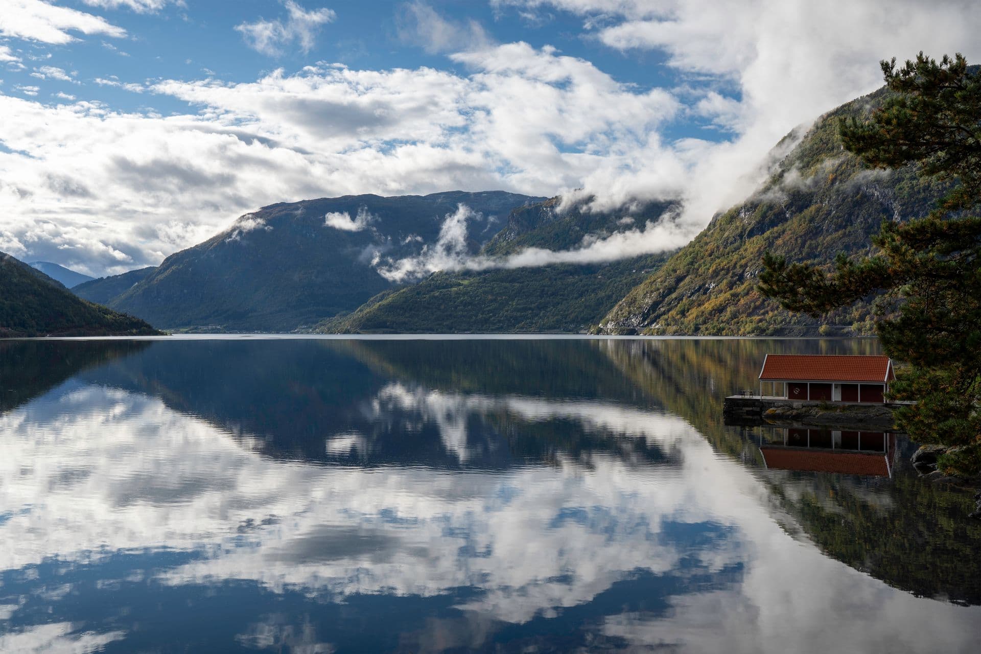 A ferry crossing a Norwegian fjord